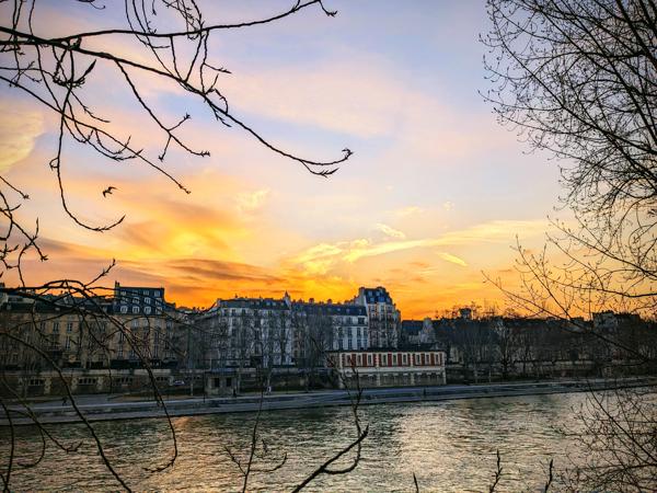 the Seine, the island of Paris, the sunset.