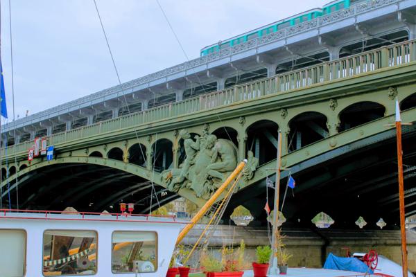 I was riding my bike, and I got this angle of my favorite bridge. The surprise gift? Capturing someone having breakfast in her or his bateaux