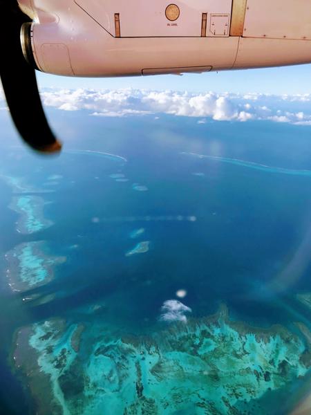 Leaving behind the island of Pines, New Caledonia, the Pacific. Fractals in the sea.