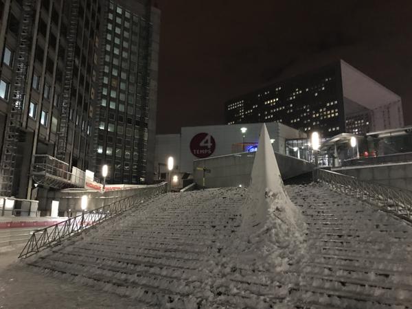 Every winter is more strange, snow over Paris. The stairs up to the Esplanade de la Defénse