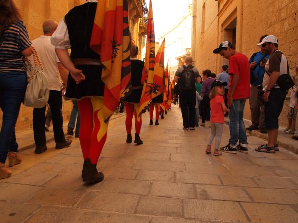Maltese are very religious. Also they love "festa". One of the many processions that everybody joined the spectacle.