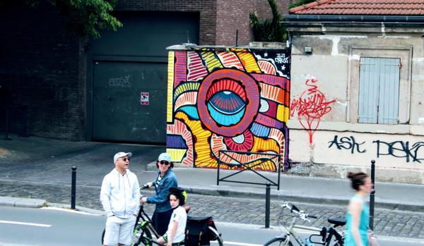 I was looking, it was staring back. Around Canal de St Martin, Paris.